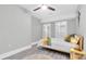 Bright bedroom with modern design elements, including sleek flooring and spacious closets at 2439 6Th N Ave, St Petersburg, FL 33713