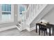 Bright staircase with landing workspace featuring minimalist desk at 2439 6Th N Ave, St Petersburg, FL 33713