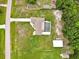 Perfectly situated home on a large lot with a screened pool, an expansive lawn and extra storage buildings at 25555 Oaks Blvd, Land O Lakes, FL 34639