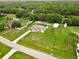 Sprawling property with meticulously maintained grounds, long driveway and large outbuilding for extra storage at 25555 Oaks Blvd, Land O Lakes, FL 34639