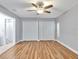 Spacious bedroom featuring hardwood floors and large closets, providing ample storage and a clean aesthetic at 25555 Oaks Blvd, Land O Lakes, FL 34639