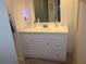 Bathroom featuring a vanity with ample cabinet space and a mirror at 2616 Cove Cay Dr # 104, Clearwater, FL 33760