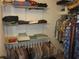 Organized closet space with shelving and hanging rods at 2616 Cove Cay Dr # 104, Clearwater, FL 33760