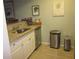 Updated kitchen area with stainless steel appliances and granite countertops at 2616 Cove Cay Dr # 104, Clearwater, FL 33760