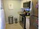 Modern kitchen equipped with stainless steel appliances and ample storage at 2616 Cove Cay Dr # 104, Clearwater, FL 33760