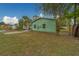 A spacious backyard with a paver patio and mature trees at 2931 23Rd N St, St Petersburg, FL 33713