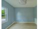 Inviting bedroom bathed in natural light, complemented by hardwood floors and fresh paint at 2931 23Rd N St, St Petersburg, FL 33713