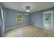 Spacious bedroom featuring new flooring, stylish ceiling fan, and ample natural light at 2931 23Rd N St, St Petersburg, FL 33713