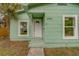 A charming home featuring an inviting front entry way and a light green color scheme at 2931 23Rd N St, St Petersburg, FL 33713
