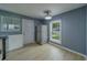 Bright and modern kitchen with stainless steel refrigerator and lots of natural light at 2931 23Rd N St, St Petersburg, FL 33713