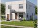 Modern home featuring a minimalist design, clean lines, and inviting curb appeal with a small front yard and seating area at 2932 Fairfield S Ave, St Petersburg, FL 33712