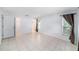Spacious bedroom with tiled floors, natural light, walk in closet and neutral walls at 3021 Jarvis St, Holiday, FL 34690