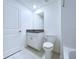 The bathroom features a granite vanity, a toilet, and a tub with a shower at 30729 Veridian Way, Wesley Chapel, FL 33543