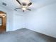 Comfortable bedroom with a ceiling fan, carpet, and closet at 30729 Veridian Way, Wesley Chapel, FL 33543