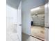 Entryway view of half bath and garage entrance at 30729 Veridian Way, Wesley Chapel, FL 33543