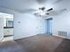 Primary bedroom featuring carpet, ceiling fan, and ensuite bathroom at 30729 Veridian Way, Wesley Chapel, FL 33543