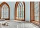 Luxurious bathroom featuring a marble counter, soaking tub and custom windows with beautiful woodwork at 3144 W Waverly Park, Tampa, FL 33629