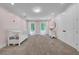 Bedroom with plush carpet, large closet and windows allowing natural light at 3144 W Waverly Park, Tampa, FL 33629