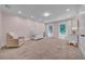 Bright Bedroom with pastel walls, soft carpet, and large windows offering serene views at 3144 W Waverly Park, Tampa, FL 33629