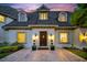 Charming home exterior with stone accents, manicured landscaping, and a welcoming entrance at 3144 W Waverly Park, Tampa, FL 33629