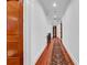 Upstairs hallway boasts wooden floors, an ornate staircase and decorative doors at 3144 W Waverly Park, Tampa, FL 33629