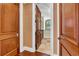 Hallway view into laundry room with ample counter space and storage at 3144 W Waverly Park, Tampa, FL 33629