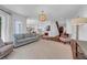 Open floor plan living room features hardwood floors and plenty of natural light at 3144 W Waverly Park, Tampa, FL 33629