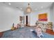Well-lit playroom with playful decor, hardwood floors, and an inviting atmosphere at 3144 W Waverly Park, Tampa, FL 33629