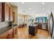 Open kitchen featuring granite countertops and stainless steel appliances at 3228 Stonegate Falls Dr, Land O Lakes, FL 34638