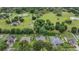 Sprawling neighborhood featuring well-manicured lawns, mature trees, and community pools at 4418 Gentrice Dr, Valrico, FL 33596