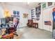 Spacious room with ample lighting, a large leather chair, a computer desk, and many decorations at 4418 Gentrice Dr, Valrico, FL 33596
