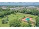Community amenities including a pool and park, as seen from an aerial view at 4506 La Capri Ct, Tampa, FL 33611