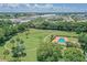 Beautiful aerial view of the pool, playground, and green spaces with walking paths at this community at 4506 La Capri Ct, Tampa, FL 33611