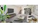 Bright living room with modern furnishings, decorative wall shelves, and carpet flooring at 4506 La Capri Ct, Tampa, FL 33611