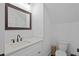Cozy bathroom with white vanity, modern fixtures and toilet at 502 E Robles St, Tampa, FL 33602