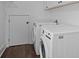 Well-lit laundry room with modern white washer and dryer at 502 E Robles St, Tampa, FL 33602