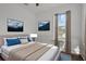 Bright main bedroom featuring neutral colors, natural light, and modern decor for comfort at 502 E Robles St, Tampa, FL 33602