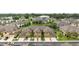 An aerial view of a meticulously maintained neighborhood with well-manicured lawns at 5153 Bay Isle Cir, Clearwater, FL 33760
