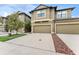 Townhome exterior with attached garages and neutral paint at 5153 Bay Isle Cir, Clearwater, FL 33760