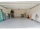 Spacious two car garage with epoxy floors, room for storage and door to backyard at 5153 Bay Isle Cir, Clearwater, FL 33760