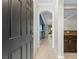 Hallway with tile flooring leading into living area at 5153 Bay Isle Cir, Clearwater, FL 33760