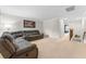 Spacious living room featuring a comfortable sectional sofa and neutral decor at 5153 Bay Isle Cir, Clearwater, FL 33760