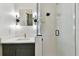 Modern bathroom boasting sleek glass shower, square sink with gold fixtures and vanity at 5813 Bent Grass Dr, Valrico, FL 33596