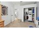Bright bedroom showcasing a closet with ample storage, open doorway leading to additional rooms, and neutral carpeting at 5813 Bent Grass Dr, Valrico, FL 33596