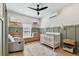Cozy Bedroom features natural light, modern fixtures and custom cabinetry at 5813 Bent Grass Dr, Valrico, FL 33596
