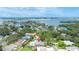 Stunning aerial view showcasing home's location within a waterfront community; perfect for buyers! at 5871 Oakhurst Dr, Seminole, FL 33772