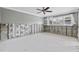 Cozy bedroom with a ceiling fan, bright windows, and space ready to be transformed into a personal haven at 5871 Oakhurst Dr, Seminole, FL 33772
