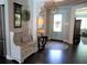Charming foyer with bench seating, decor, and view into the home's stylish interior at 5871 Oakhurst Dr, Seminole, FL 33772
