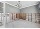 Living room featuring white trim and a contemporary light fixture at 5871 Oakhurst Dr, Seminole, FL 33772