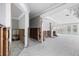 Blank canvas: living room with framework, fireplace, and views to a pool, ready for transformation and personalization at 5871 Oakhurst Dr, Seminole, FL 33772